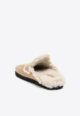 Triangle Logo Shearling Flat Mules