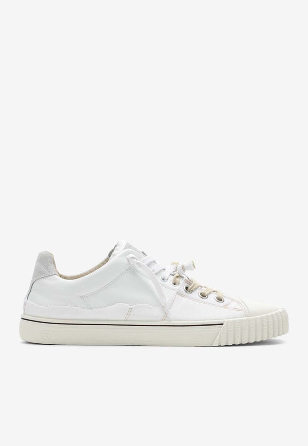 Evolution Low-Top Paneled Sneakers